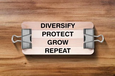 Diversify Protect Grow Repeat written on wooden stick Stock Photos