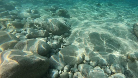 Dives in ancient volcanic eruptions with many pebbles8 Stock Footage 121187464