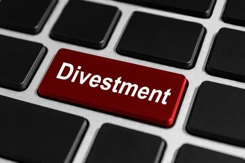 Divestment button on keyboard Stock Photos