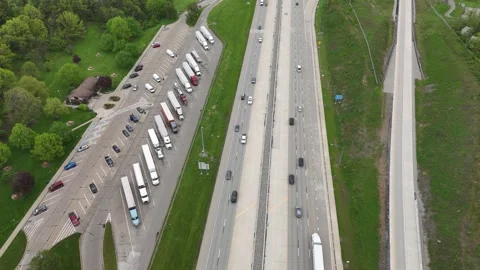Divided highway with exits, winding through picturesque countryside. Perfect Stock Footage 311772228