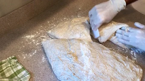 Dividing Up Bread Dough into Four Loaves, Baking Bread at Home Stock Footage 134215073
