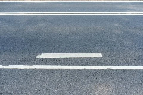 Dividing lanes on the road. Stock Photos