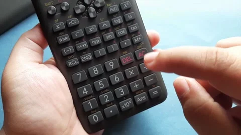 Dividing a number by zero on a calculator	 Stock Footage 285911578