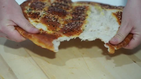 Dividing the Ramadan pide Stock Footage 147739825