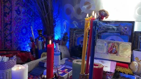 Divination and magic. Tarot cards and candles. Table with candles. Esoteric Stock Footage 237687811