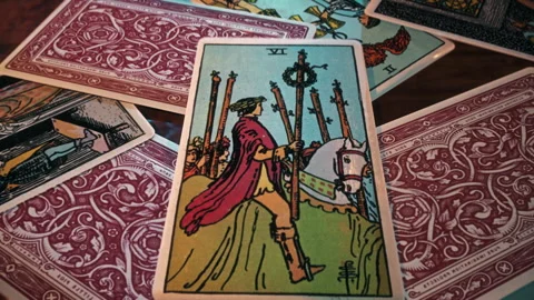 Divination belief psychic casting spell with a Six of Wands Cards from the deck Stock Footage 250782150
