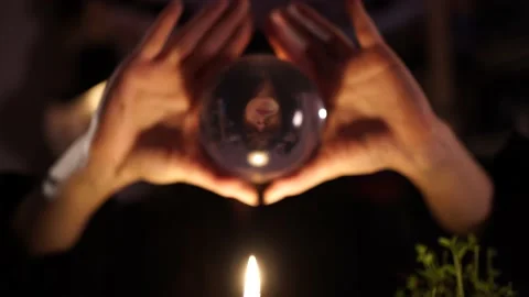 Divination on a crystal ball next to burning candles 스톡 동영상 133077029