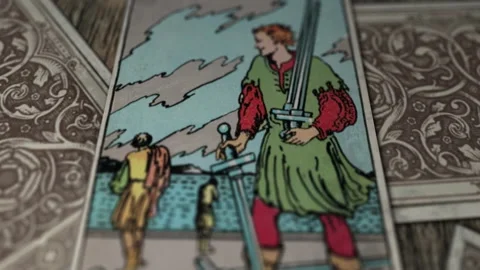 Divination lesson. Using tarot cards to predict future. Five of Swords close-up Vídeos de archivo 153104100