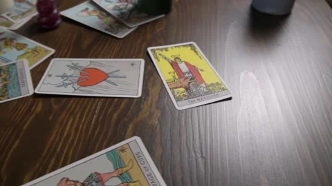 Divination by Tarot cards. A fortune teller performs a magical. Ritual Stock Footage 143775792