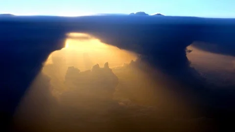 Divine glow through dark clouds seen from plane, sign from god Stock Footage 90113215