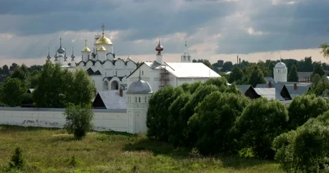 Divine view. Vintage white monastery stands among the fields Stock Footage 66564658