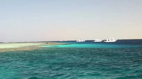 Diving boats and reef Stock Footage 10740994