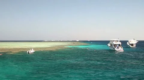 Diving boats and reef Stock Footage 10741084