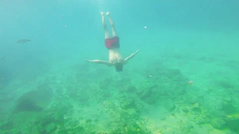 Diving with breath holding Tossa de Mar Stock Footage 172064338