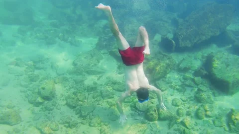 Diving with breath holding Tossa de Mar Stock Footage 172064343