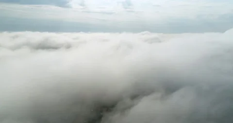 Diving in the clouds 4k Stock Footage 100796472