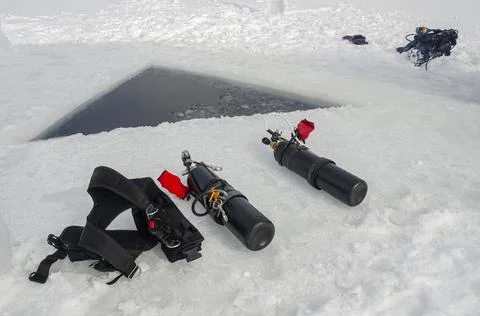 Diving in cold water under the ice Stock Photos