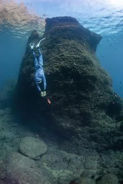 Diving holding the breath Foto stock