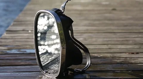 Diving mask at the edge of the water bridge. Stock-Footage 68784536