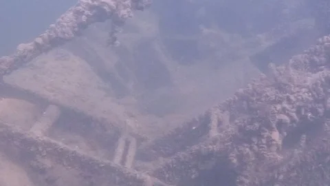 Diving past a dive excavator into a lake Stock Footage 129190886