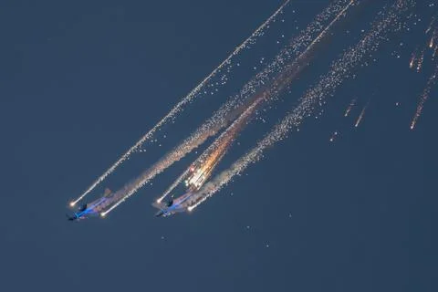 Diving planes with flares Stock Photos