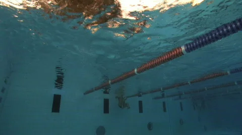Diving into a pool Stock Footage 755959