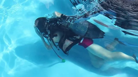 Diving in a pool Stock Footage 83414823