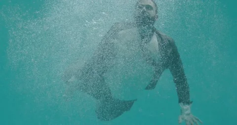 Diving into the pool Stock Footage 147396956