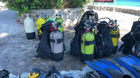 Diving pressure bottles on beach side ready Stock Footage 164069446