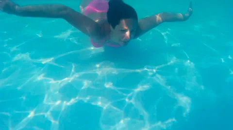 Diving in the private swimming pool Stock Footage 52883724