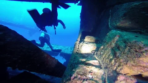 Diving in the red sea a group of divers submerged 스톡 동영상 70480656