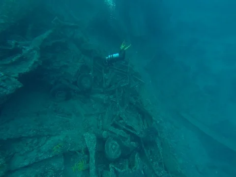 Diving in the red sea a group of divers submerged Stock Footage 73513223
