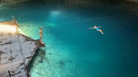 Diving Through Riviera Maya Cenotes Stock Footage 245022979