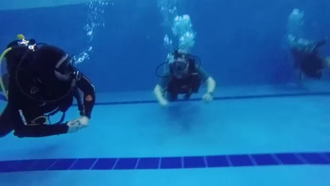 Diving training in a swimming pool. Stock Footage 301333468