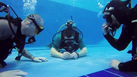 Diving training in a swimming pool. Stock Footage 301333473
