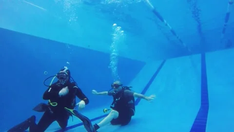 Diving training in a swimming pool. Stock Footage 301333550