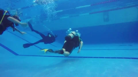Diving training in a swimming pool. Stock Footage 301333615