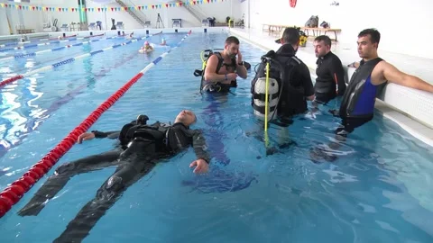 Diving training in a swimming pool. Video set. Stock Footage 309030533
