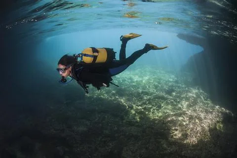 Diving in an underwater cave Stock Photos