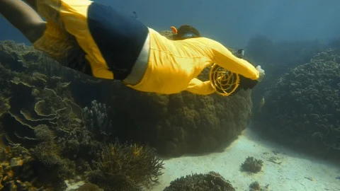 Diving underwater using sea scooters Stock Footage 88465109