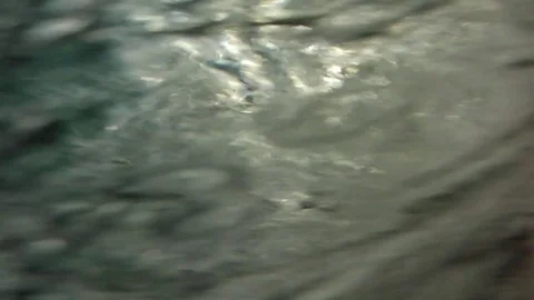 DIVING IN THE WATER WITH UNDERWATER SHOOTING Stockbeeldmateriaal 81222680