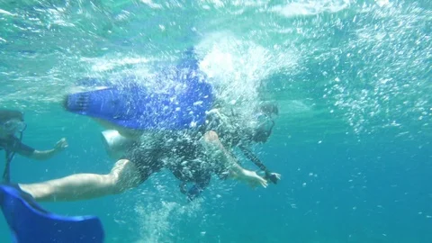 Diving On Waters Surface Stock Footage 125803131