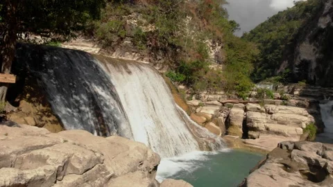Diving into the wild, one waterfall at a time Stock Footage 304947864