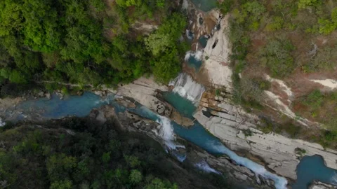 Diving into the wild, one waterfall at a time Stock Footage 304947921