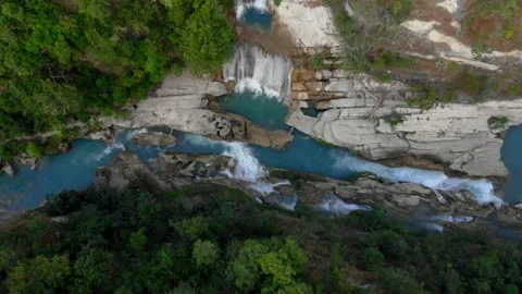 Diving into the wild, one waterfall at a time Stock Footage 304948794
