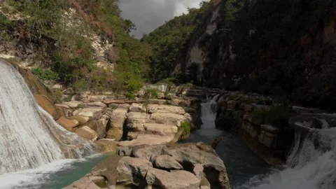Diving into the wild, one waterfall at a time Stock Footage 304948795