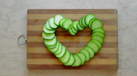 Division of cucumber as a heart Stock-Footage 26638028