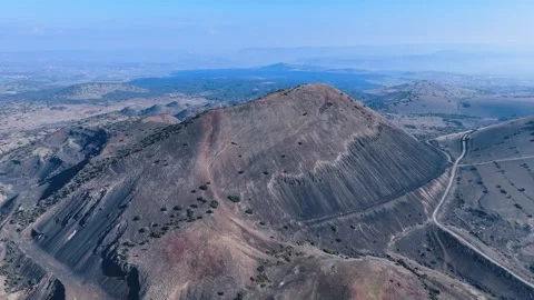 Divlit Volcano Cone and Kula geopark Stock Footage 302739256