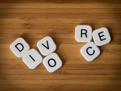Divorce concept with split word Stock Photos
