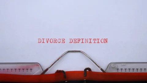 Divorce definition - phrase printed on an old typewriter in red letters Stock Footage 129535962
